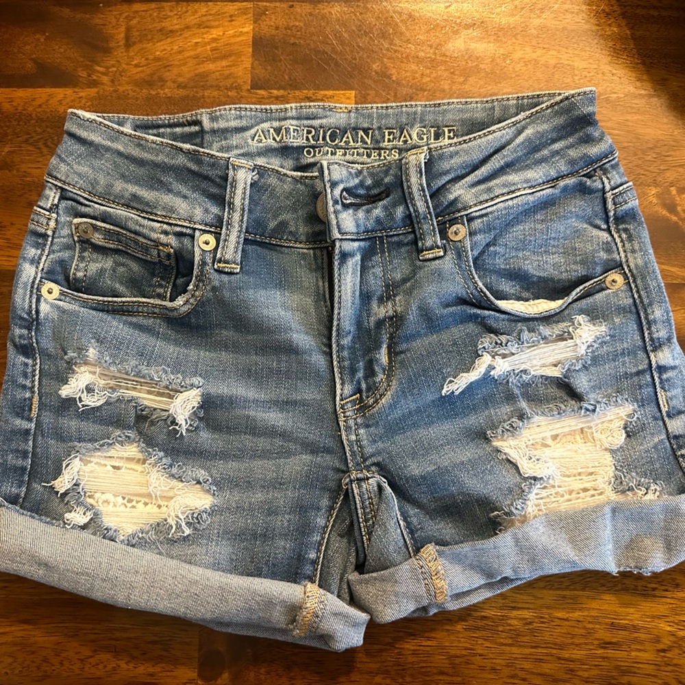 American Eagle Outfitters Light Blue Ripped Jean Shorts-never worn